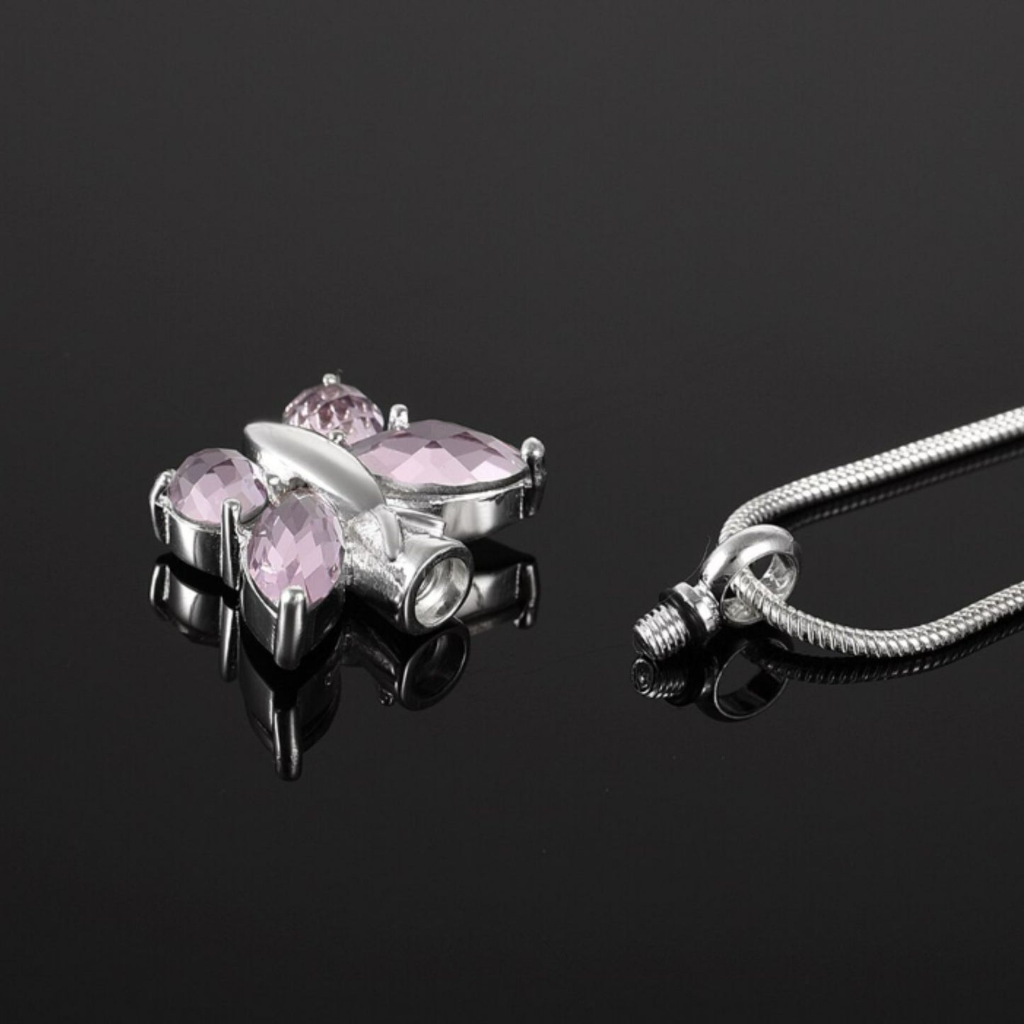 Butterfly Urn Necklace - Beautiful and meaningful jewelry for preserving cherished memories. Customizable with engraving and chain options. Perfect as memorial jewelry and a thoughtful sympathy gift.